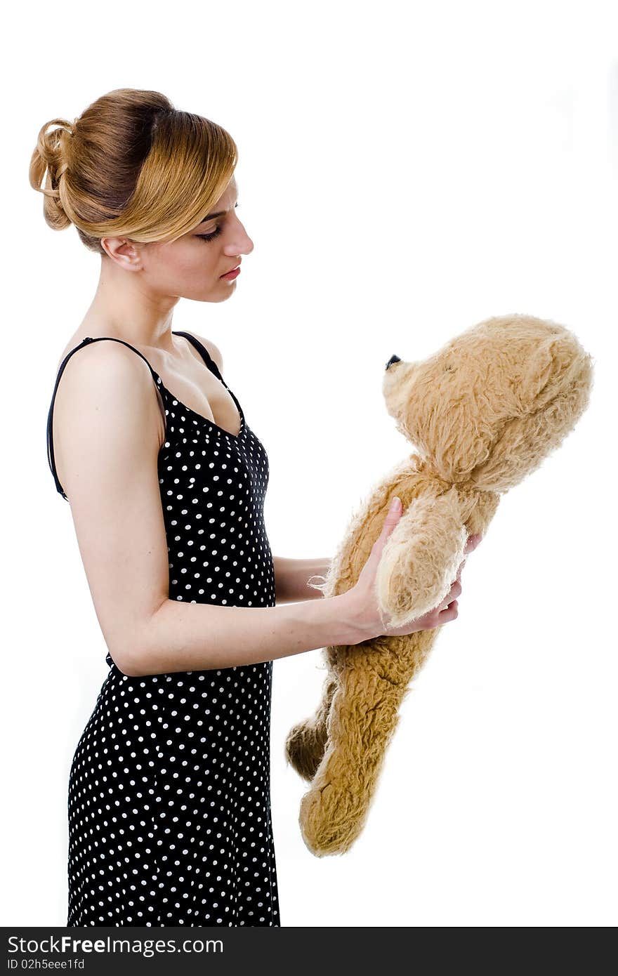 An image of a woman with a teddy-bear. An image of a woman with a teddy-bear