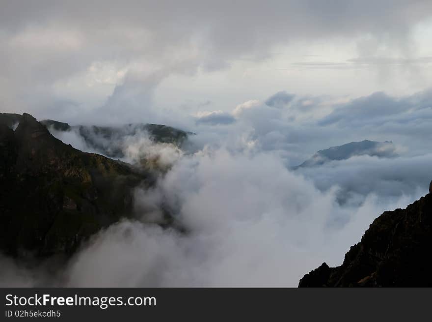 Mountains of Madeira island above the clouds at Pico do Areeiro and Ruivo. Mountains of Madeira island above the clouds at Pico do Areeiro and Ruivo