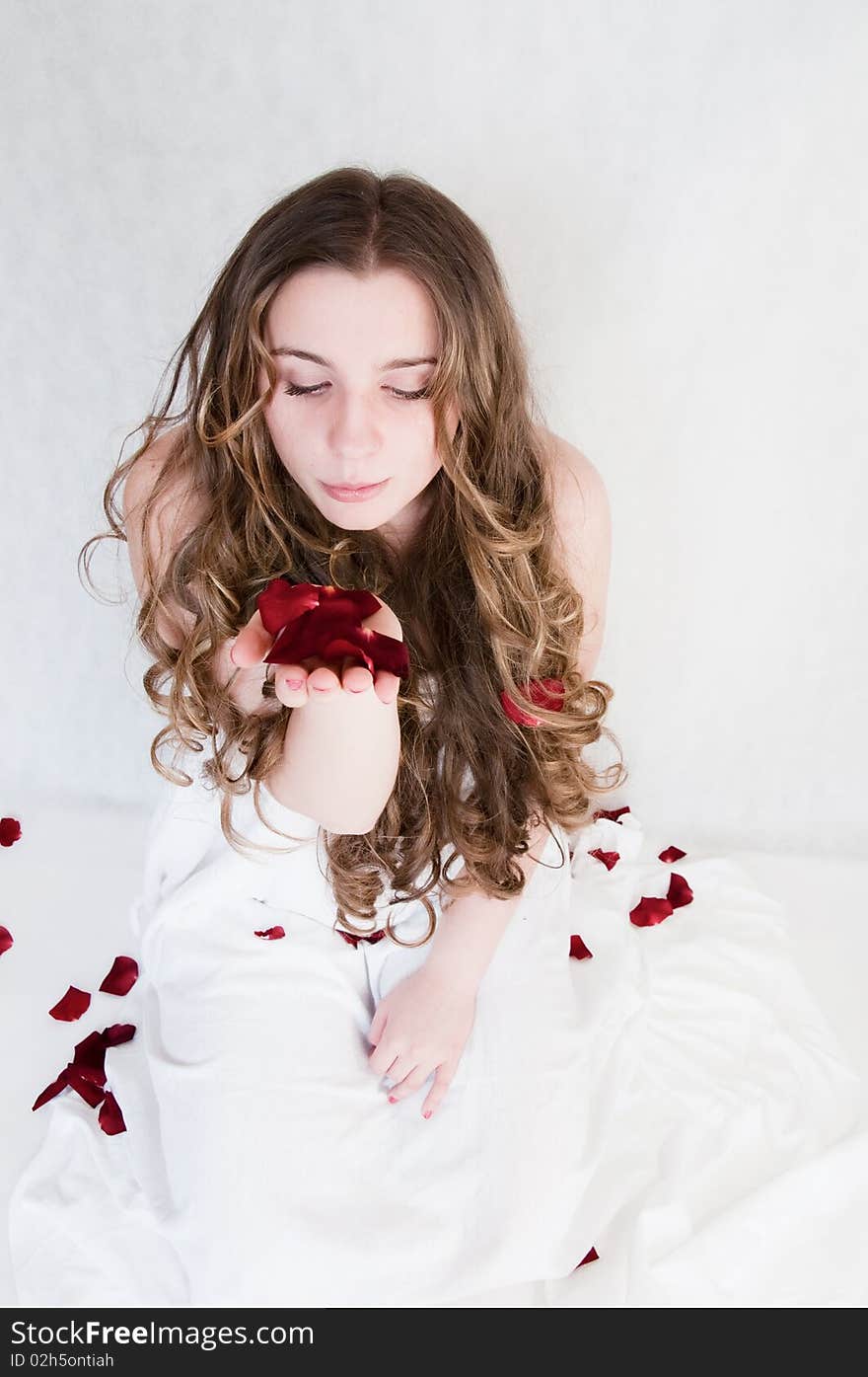 Portrait of a beautiful girl with long curls. Portrait of a beautiful girl with long curls