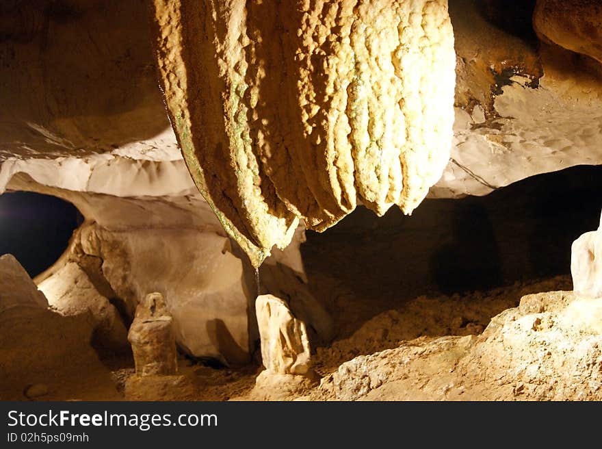 Stalactites and stalagmites in ancient caves of Borneo. Stalactites and stalagmites in ancient caves of Borneo.