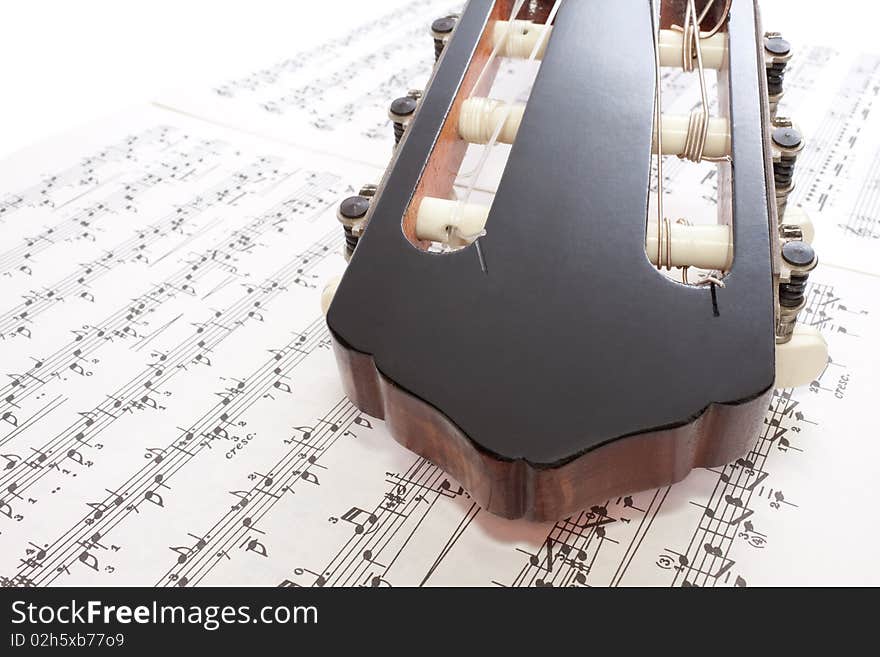 Closeup Guitar Headstock and Notes