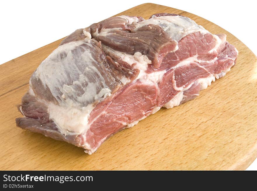 Meat on the board of a white background