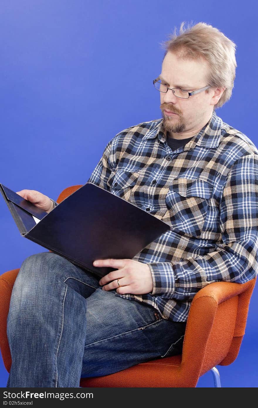 Man writing at his desk