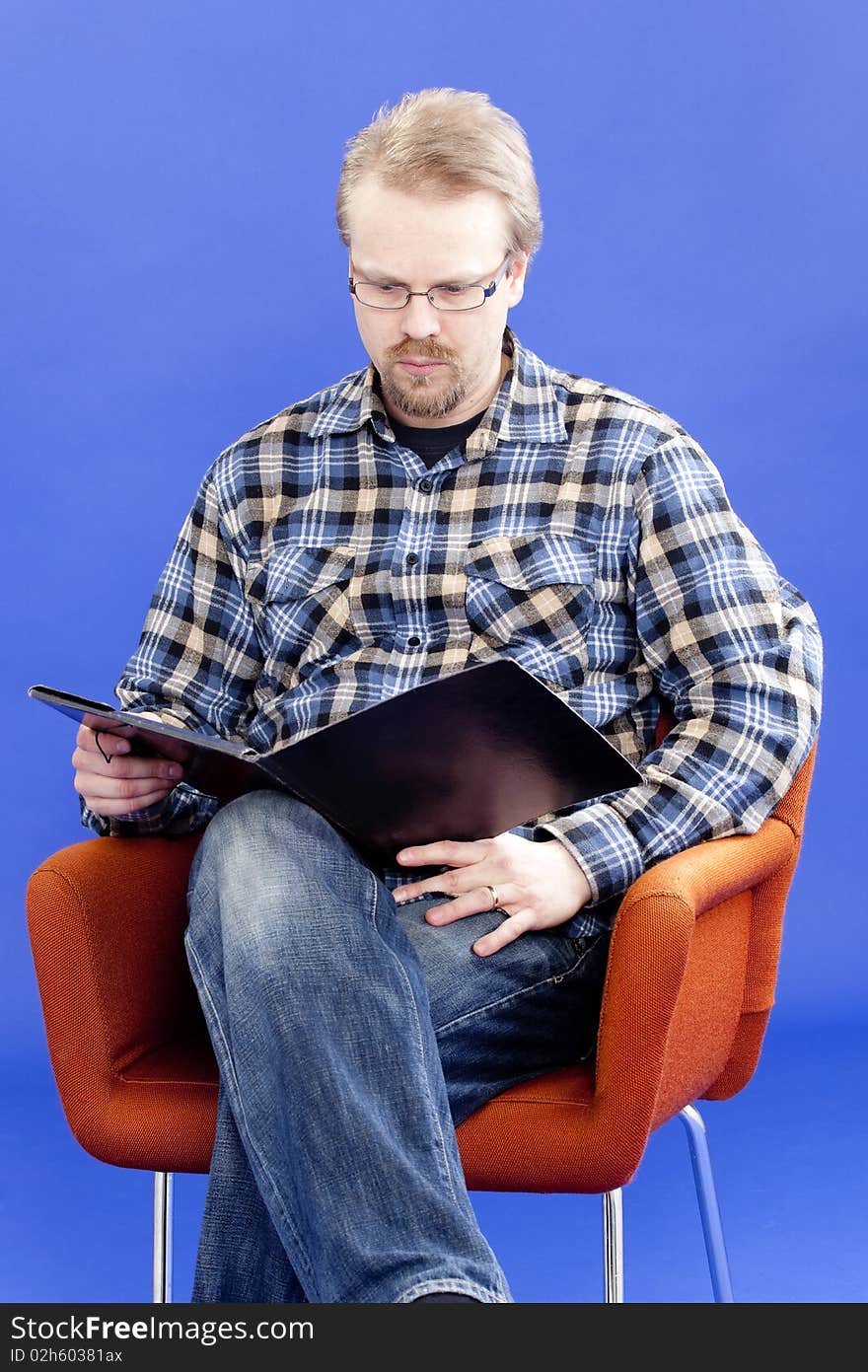 Man reads business papers