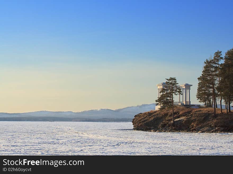 Rotunda on mountain landscape background