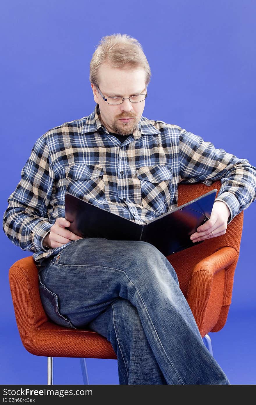 Man Reads Business Papers