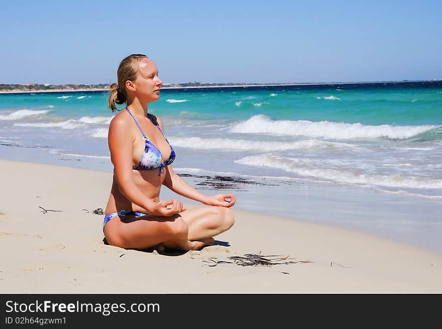 Young Beautiful Girl On The Beach