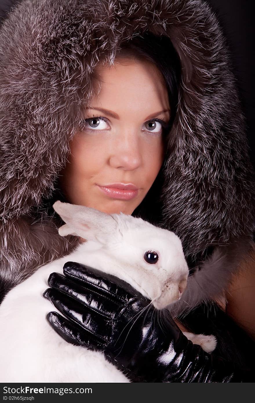 Woman holding a rabbit