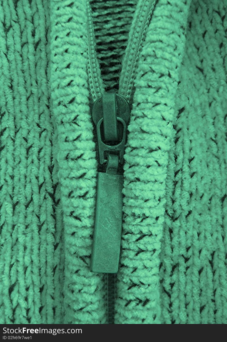 Green colored cardigan with zip. Green colored cardigan with zip