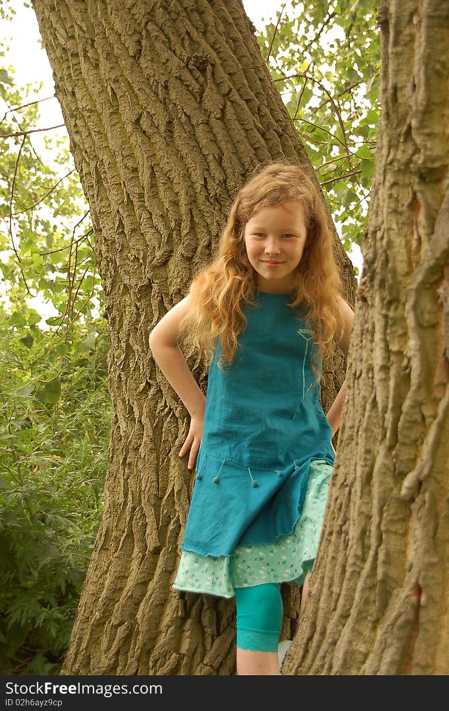 Portrait of young girl with red hair