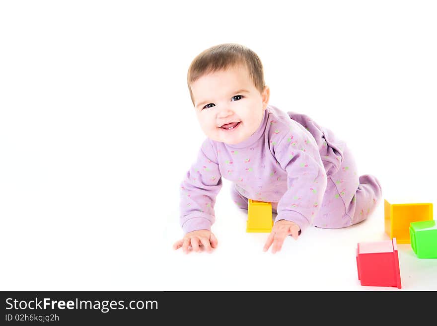 Happy child with bricks isolated on white. Happy child with bricks isolated on white