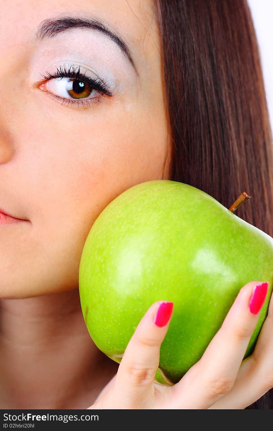 Young girl holding a green apple. Young girl holding a green apple