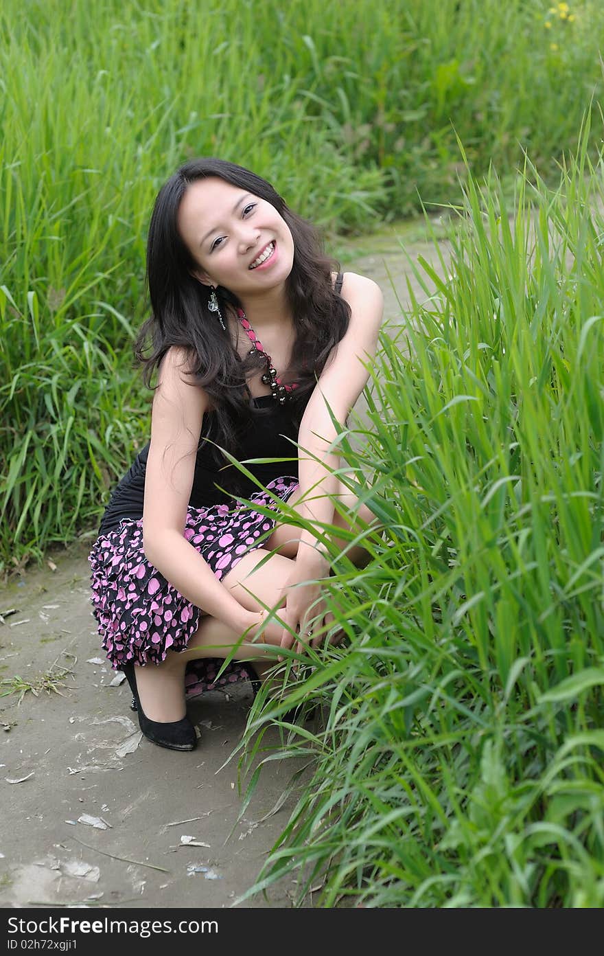 Asian girl in grass