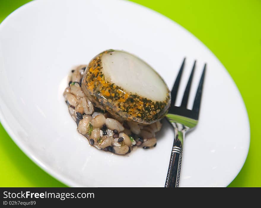 Plate of gourmet tapas with fish and barley. Plate of gourmet tapas with fish and barley