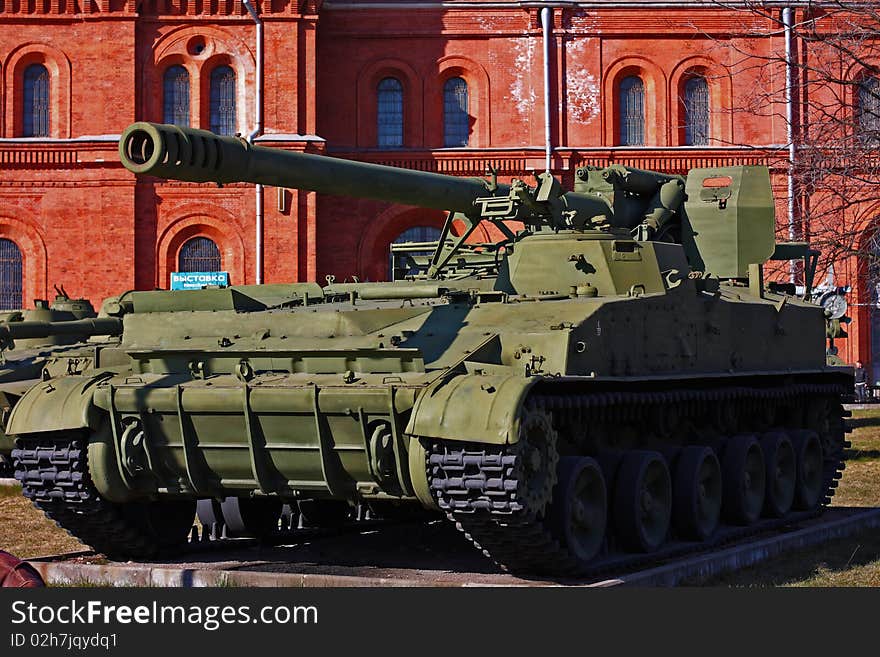 Soviet union battle tank near the red building. Soviet union battle tank near the red building