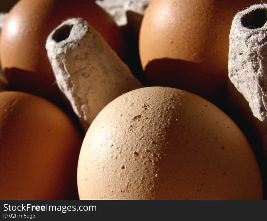 Detail photo of packed eggs in paper box. Detail photo of packed eggs in paper box