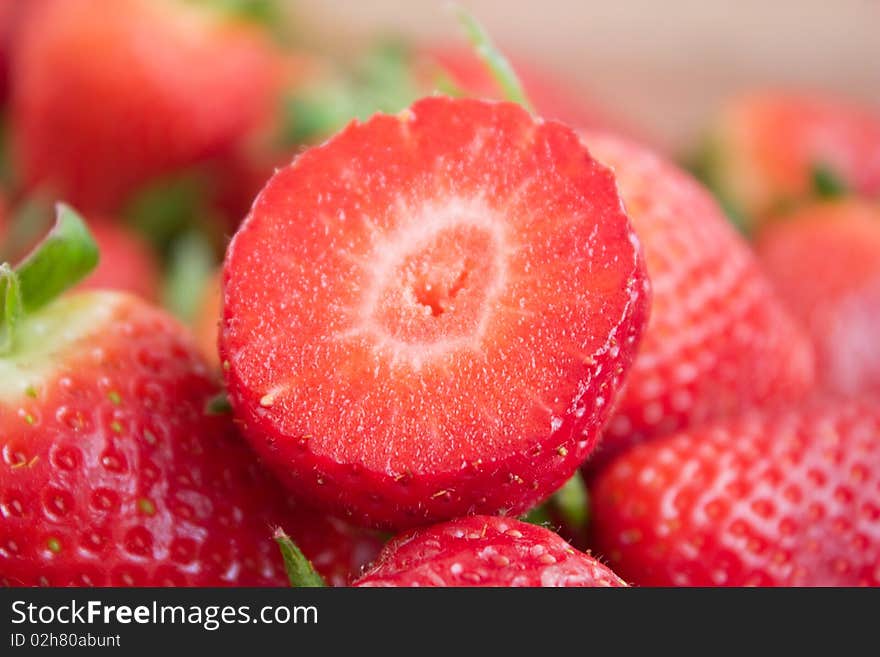 Sliced  strawberries in the basket. Sliced  strawberries in the basket.