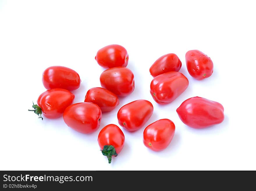 Cherry tomatoes isolated on white background.