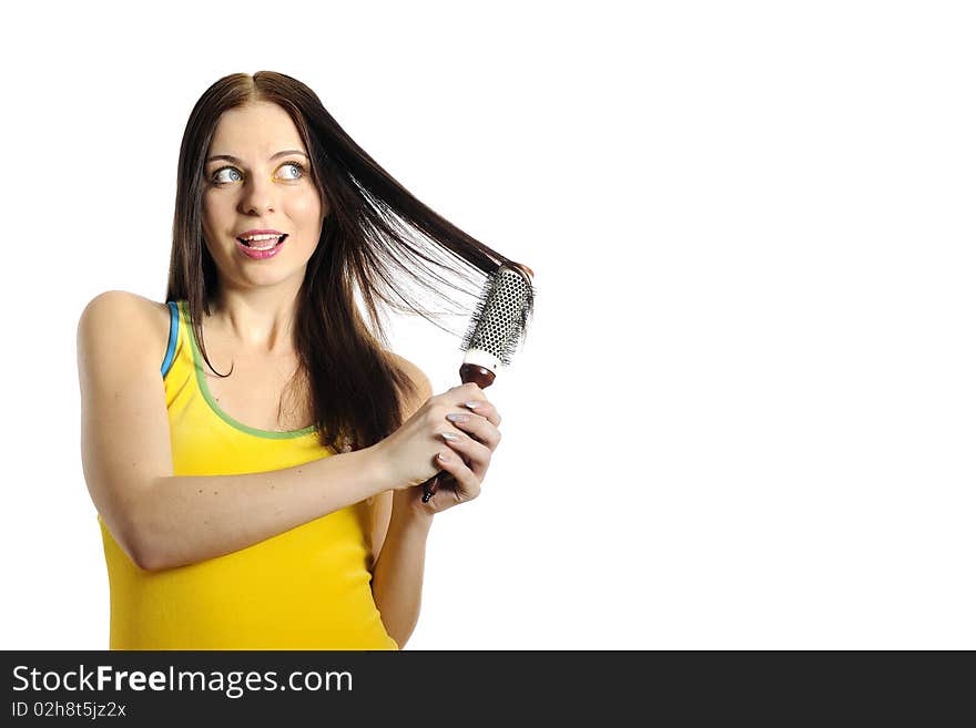 Young Beautiful Woman Brushing Her Healthy Hair