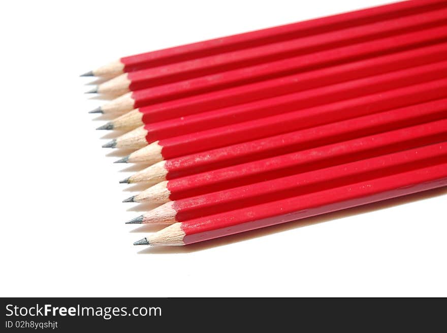 Close up of red pencil with white background. Close up of red pencil with white background