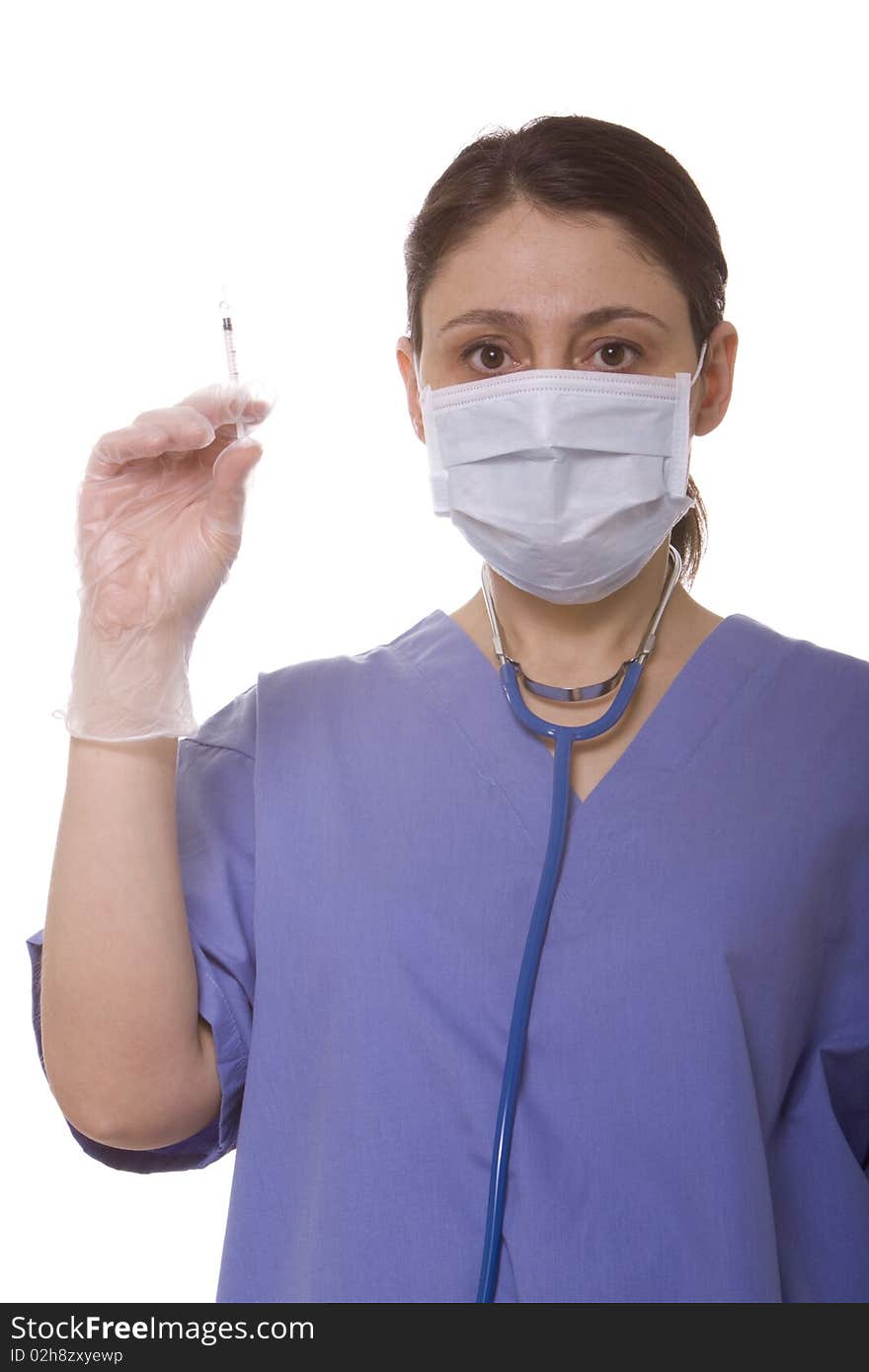 Female doctor holding a syringe. Female doctor holding a syringe