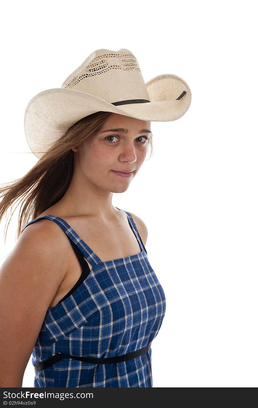 Pretty teen girl wearing an old straw hat. Pretty teen girl wearing an old straw hat