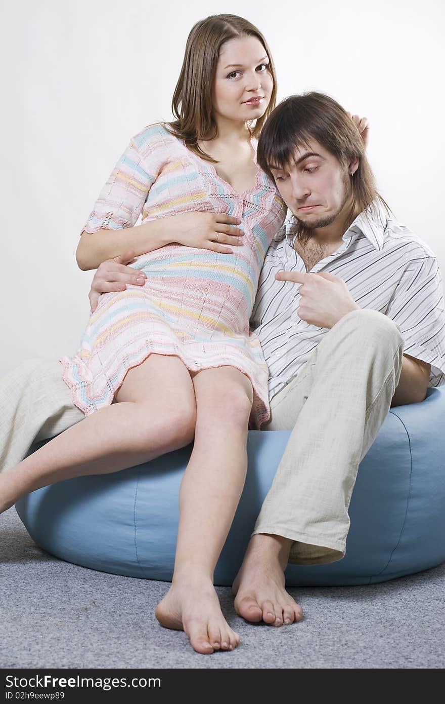 Young happy couple waiting for baby