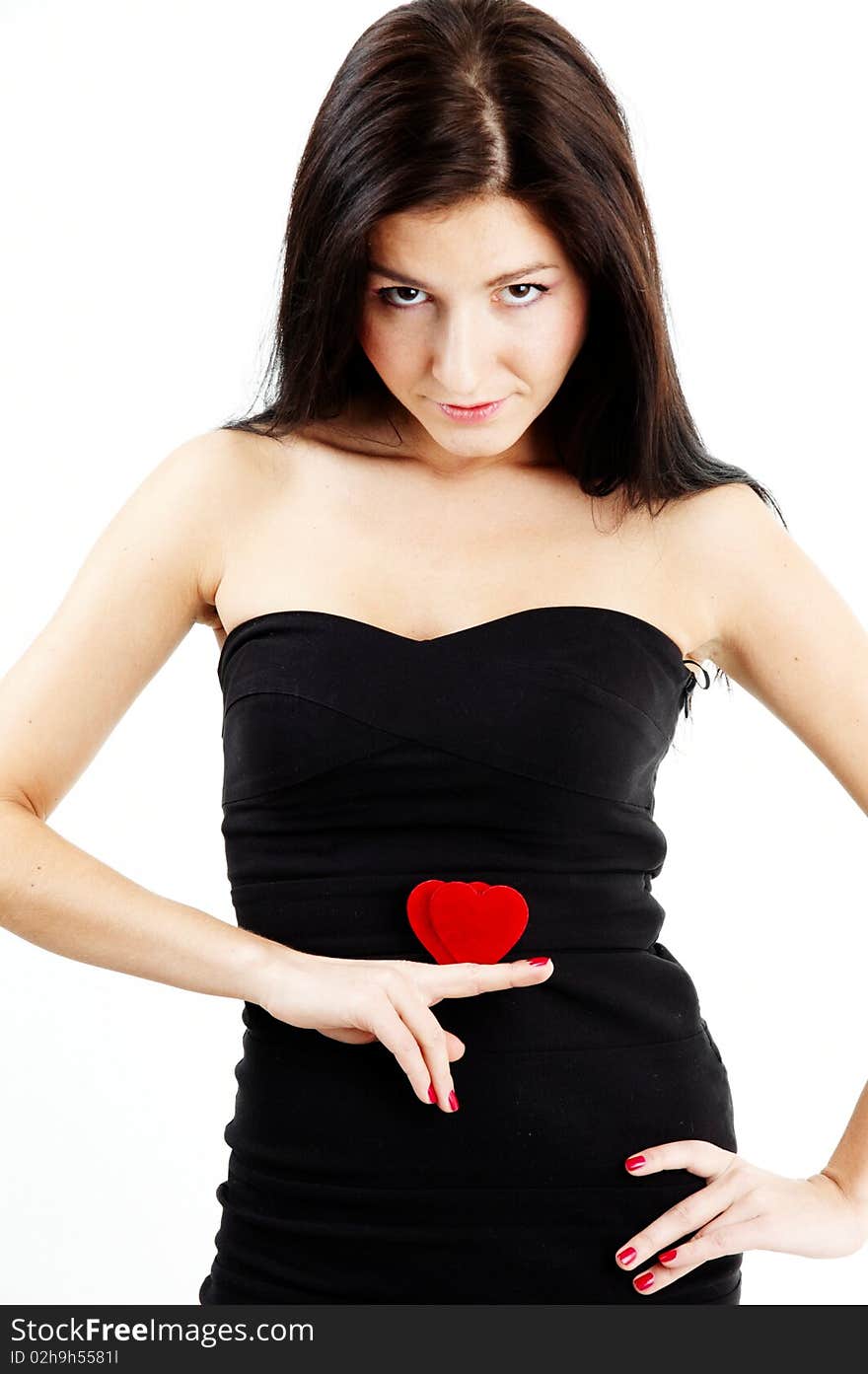 Girl holding a double heart and smiling. Girl holding a double heart and smiling