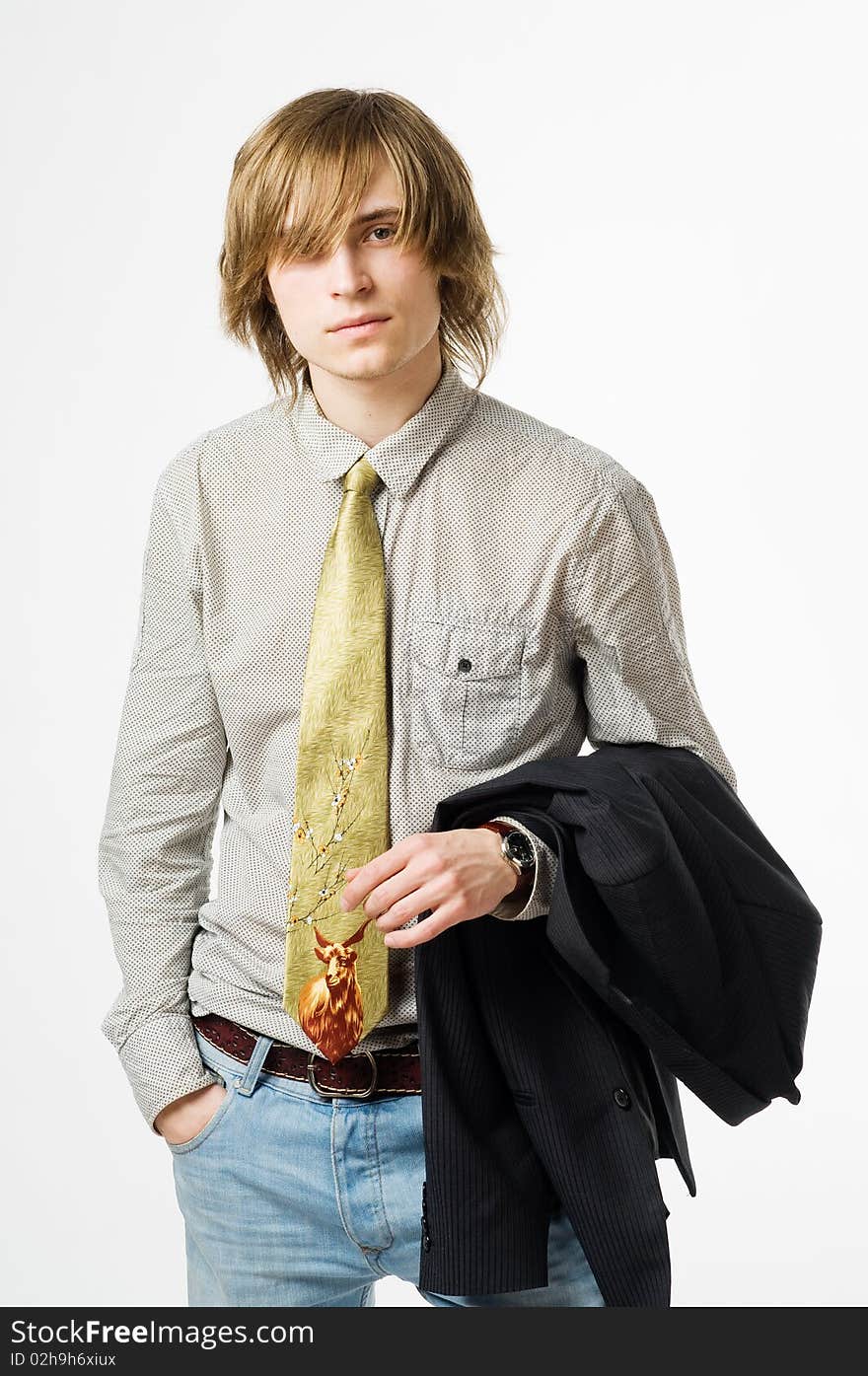 Waist Up Portrait Of Young Man On Light Gray