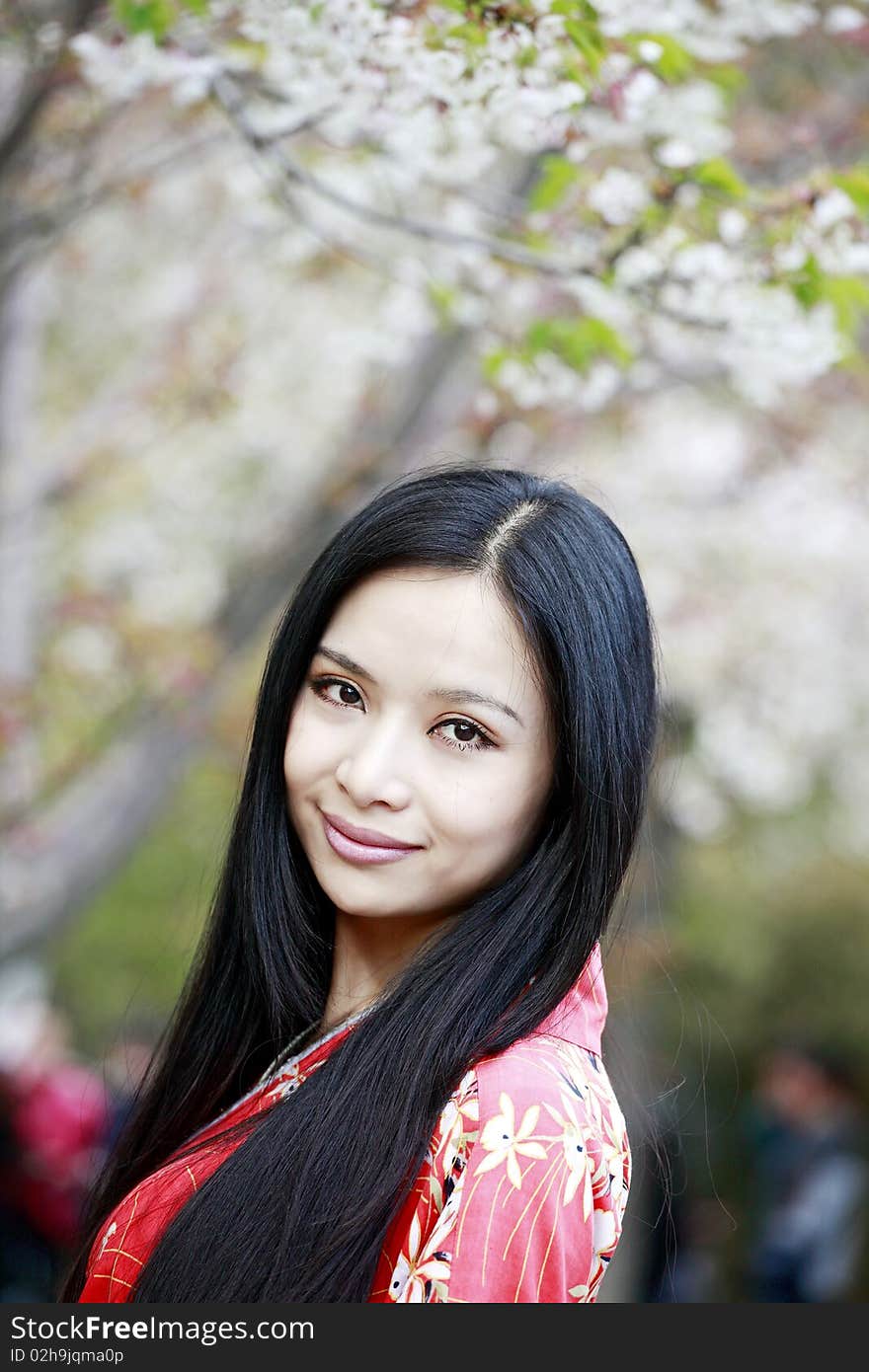 Beautiful Asian girl in cherry blossom season. Beautiful Asian girl in cherry blossom season.