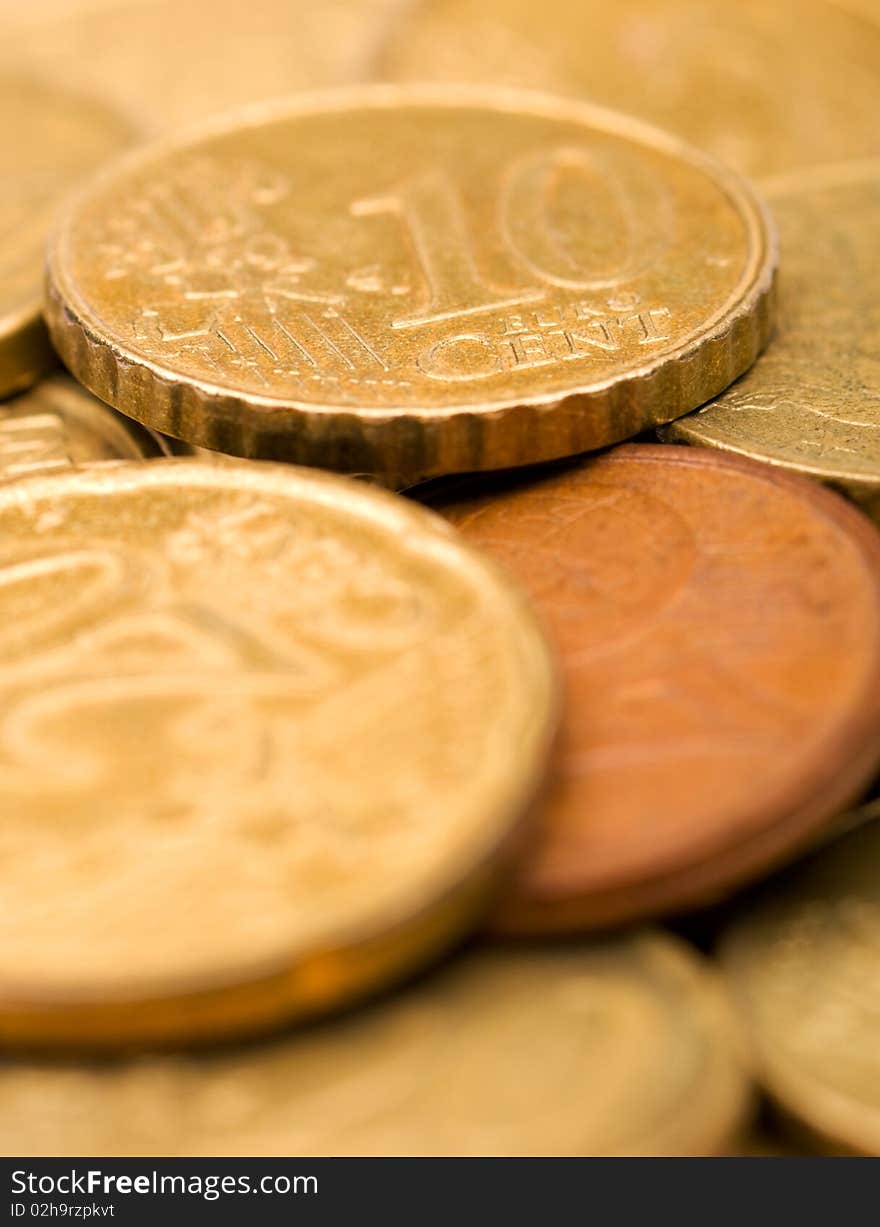 Heap of coins, isolated on white background