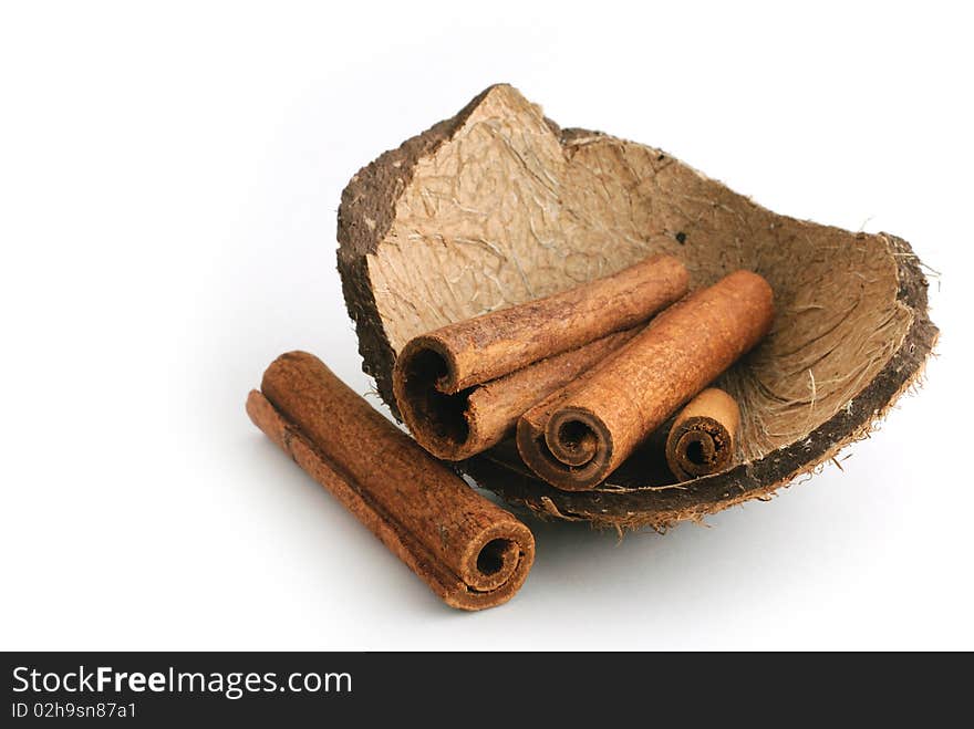 Delicious looking cinnamon with coconut peel/shell. Delicious looking cinnamon with coconut peel/shell.