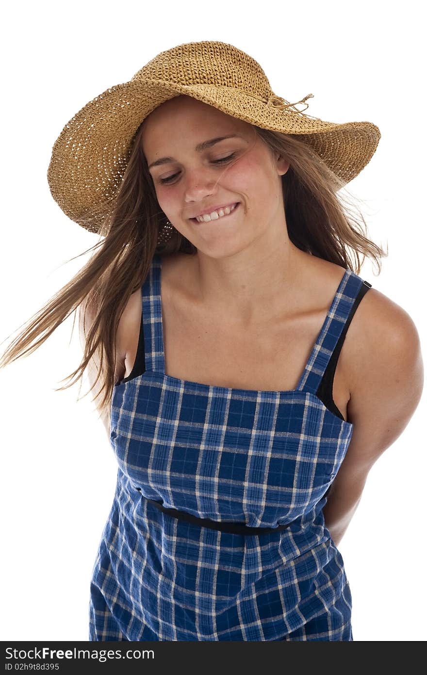 Pretty teen girl wearing an old straw hat. Pretty teen girl wearing an old straw hat