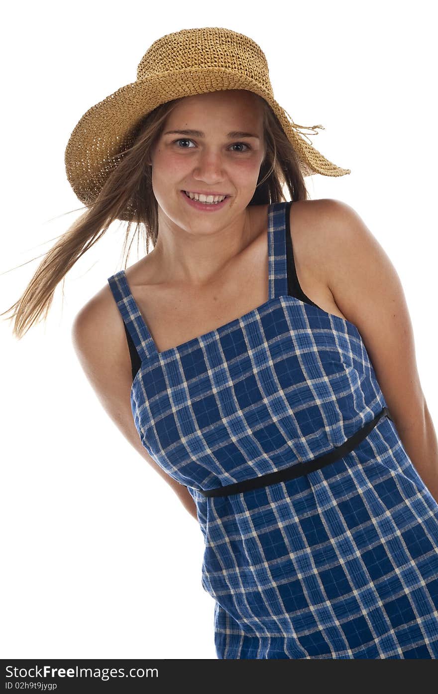 Pretty teen girl wearing an old straw hat. Pretty teen girl wearing an old straw hat