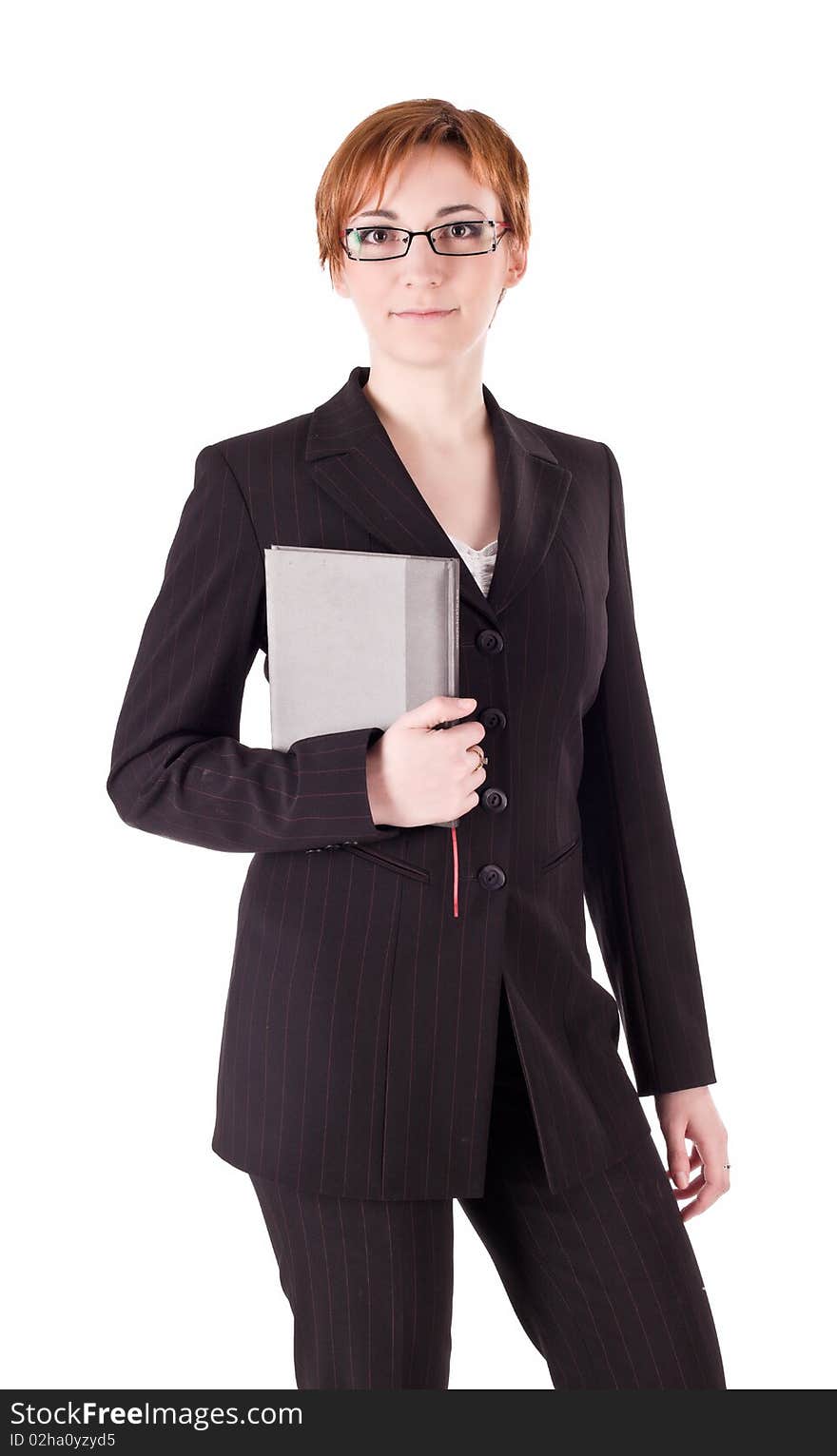 Girl with book in black suit isolated on white background. Girl with book in black suit isolated on white background