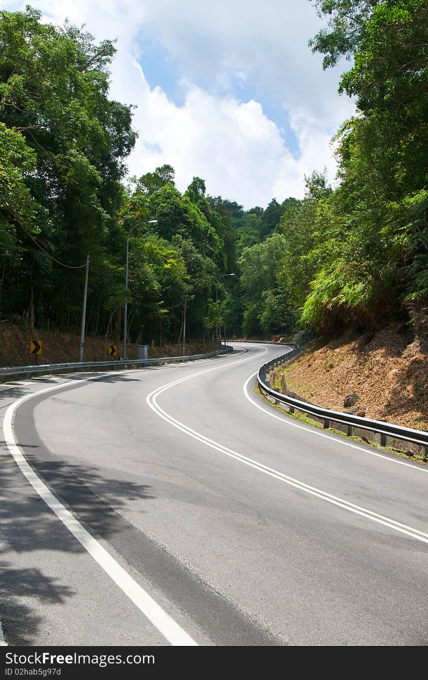 Rural scene of a s-shape curve road