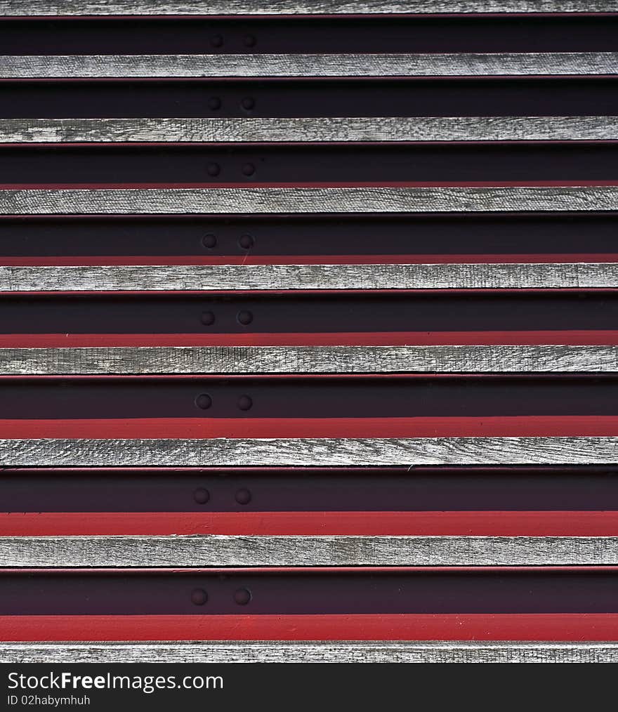 Close up of wooden Stairs and red steel. Close up of wooden Stairs and red steel