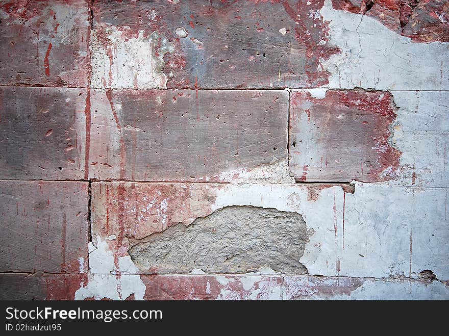 Old dirty bricks wall with cracked cement. Old dirty bricks wall with cracked cement