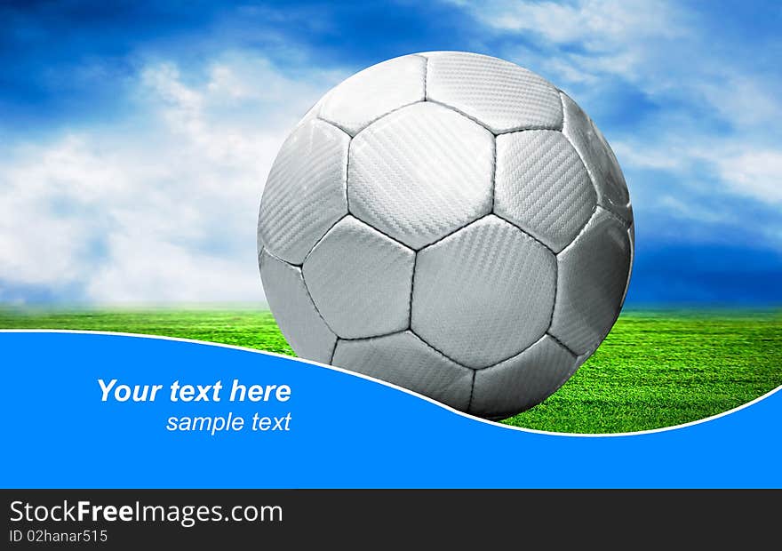 Ball on the outdoors field  with blue sky and sample text. Ball on the outdoors field  with blue sky and sample text