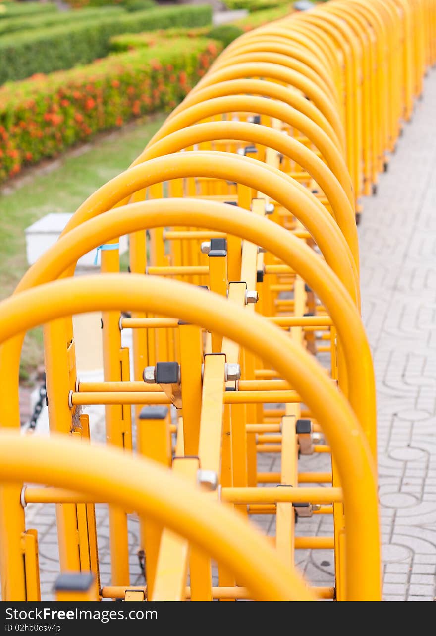 Fence color yellow sidewalk