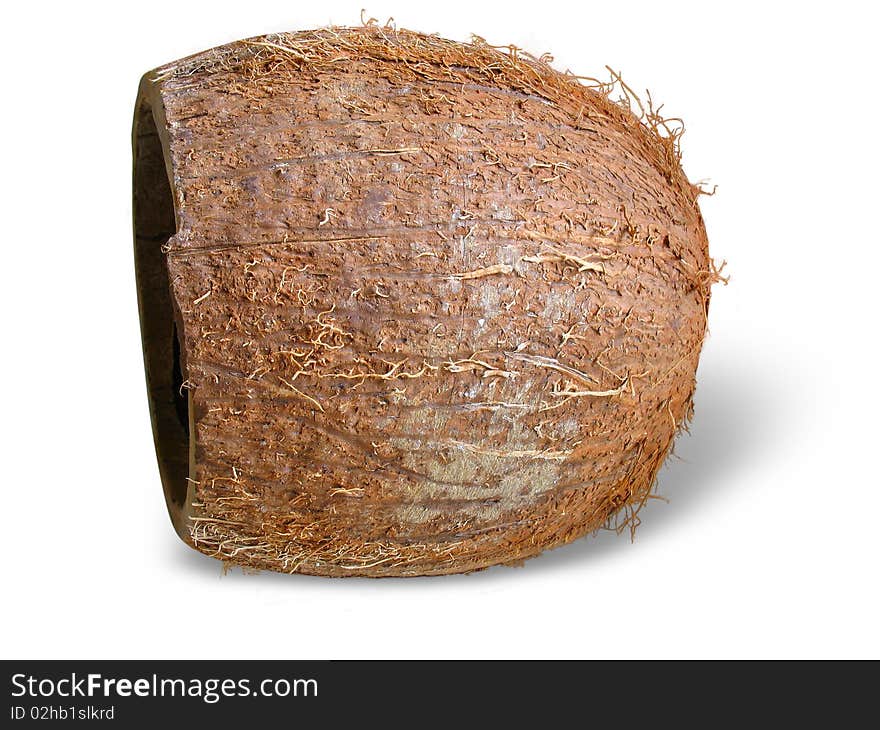 Cracked brown coconut isolated over white background. Cracked brown coconut isolated over white background