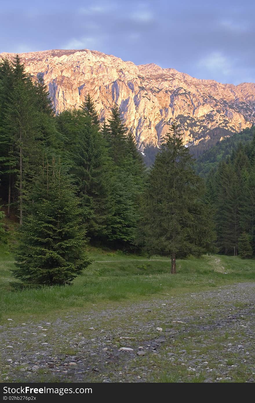 Last rays of the sun at sunset before the rain started in Piatra Craiului Mountain, Carpathians, Romania. Last rays of the sun at sunset before the rain started in Piatra Craiului Mountain, Carpathians, Romania.