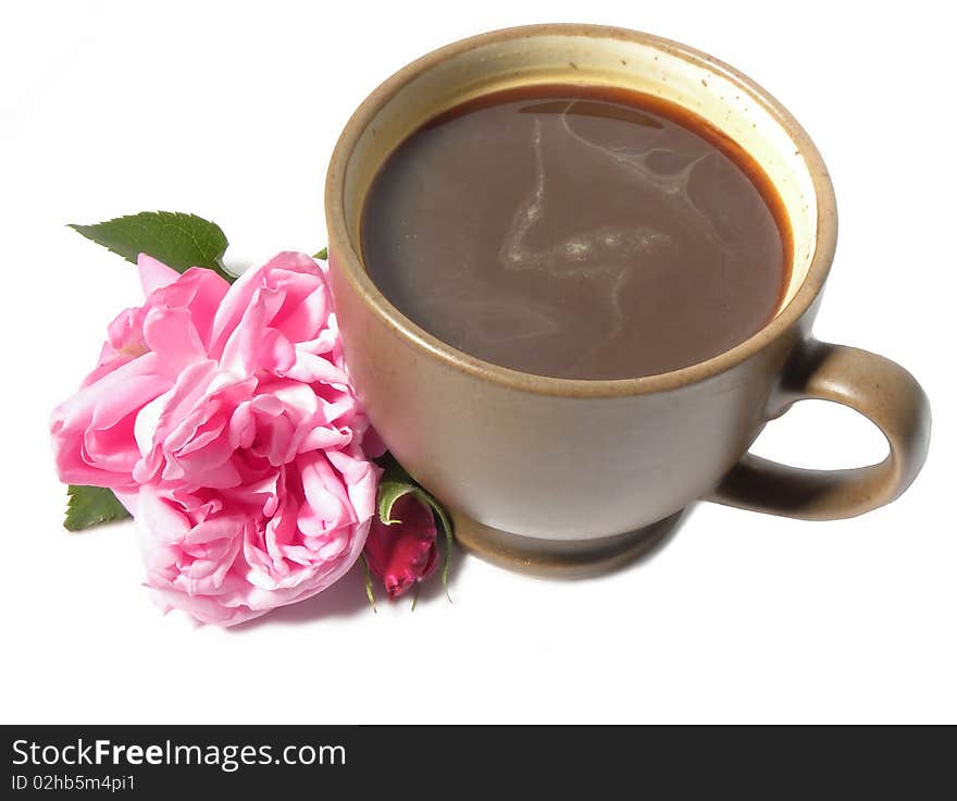 A cup of coffee and a pink rose isolated on white background