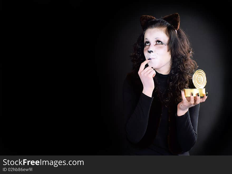 Portrait of a Cat-girl with the can. Studio shot. Portrait of a Cat-girl with the can. Studio shot.