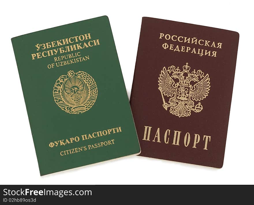 Uzbekistan and Russian passports. Isolated on white.