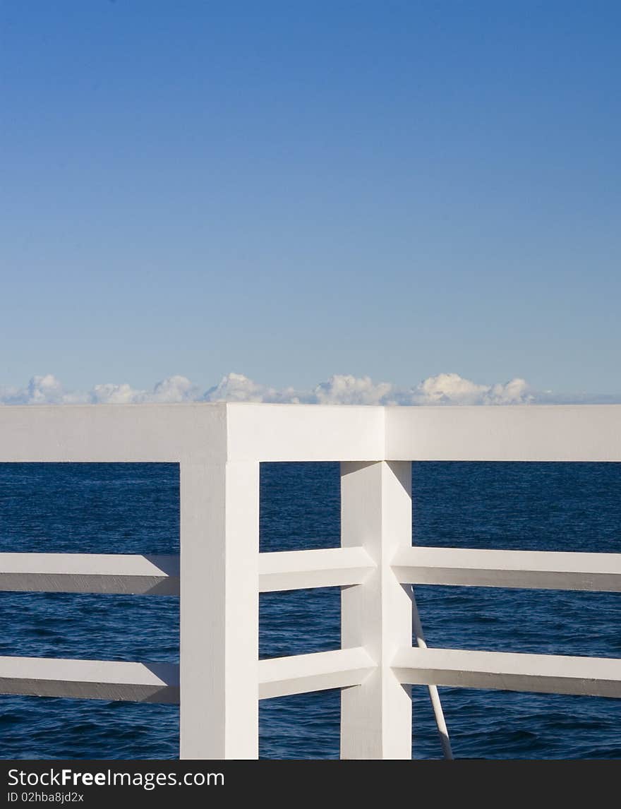 White jetty balustrade made of wood