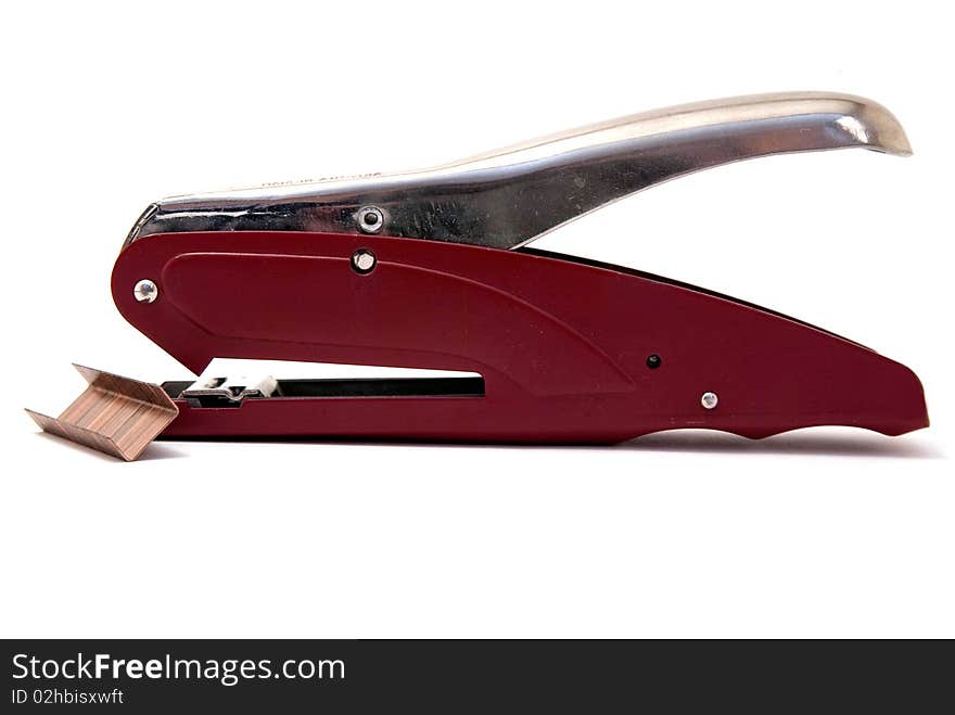 Red stapler isolated on white background