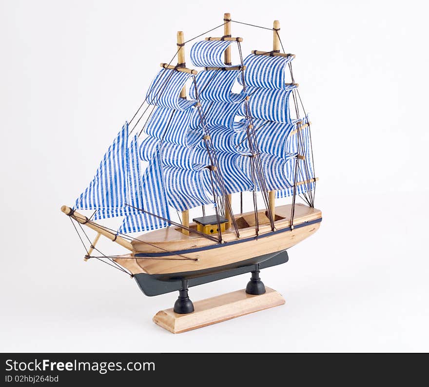 Boat sailing model white background, isolated. Boat sailing model white background, isolated