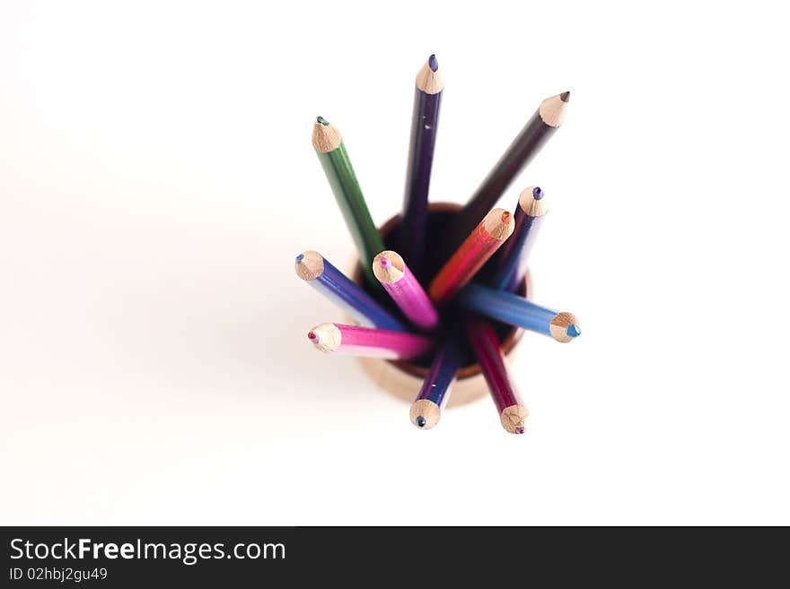 Colored pencils with eraser on white background. Colored pencils with eraser on white background