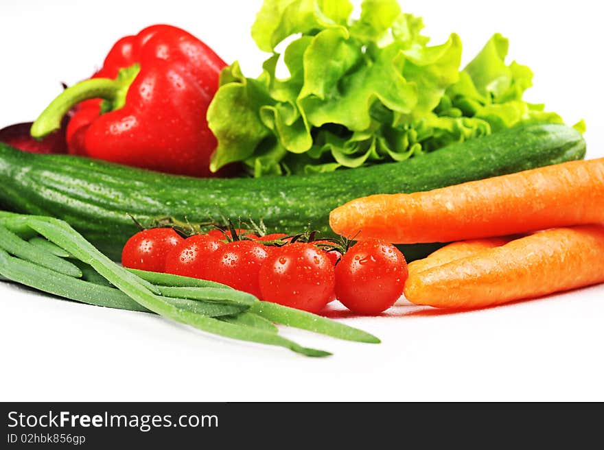 Fresh vegetables. Included are  tomatoes, carrots, cucumber, onions